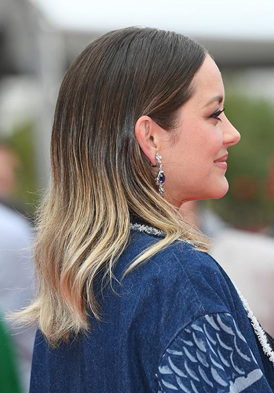 01-04-210707-marion-cotillard-en-short-a-cannes-photo-5.jpg