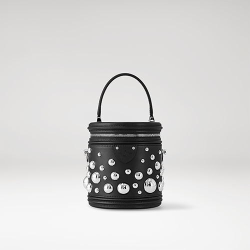 221219_2_Louis-Vuitton-x-Yayoi-Kusama-Cannes-in-black-taurillon-leather-with-3D-silver-toned-metal-half-spheres.gif