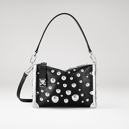 221219_6_Louis-Vuitton-x-Yayoi-Kusama-Side-Trunk-in-black-taurillon-leather-with-3D-silver-toned-metal-half-spheres.gif