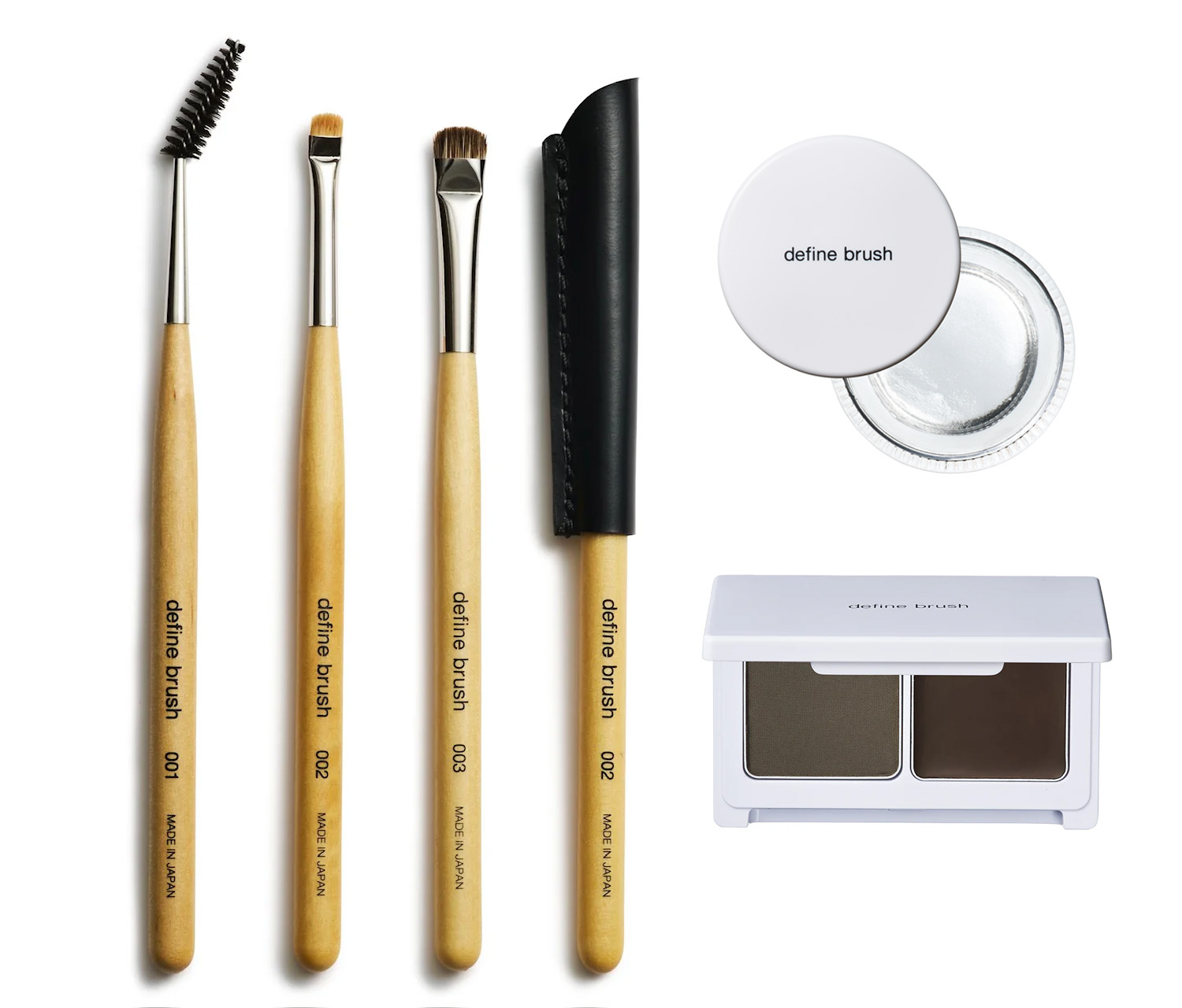 Set of five makeup brushes with wooden handles, a black leather roll, plus a white round powder container and a two-shade brown eyeshadow palette in a white case.