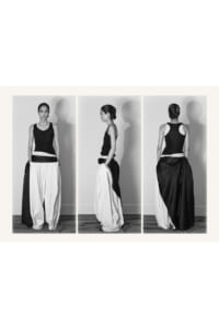Model wears a sleeveless black top with voluminous white pants shown from front, side, and back.