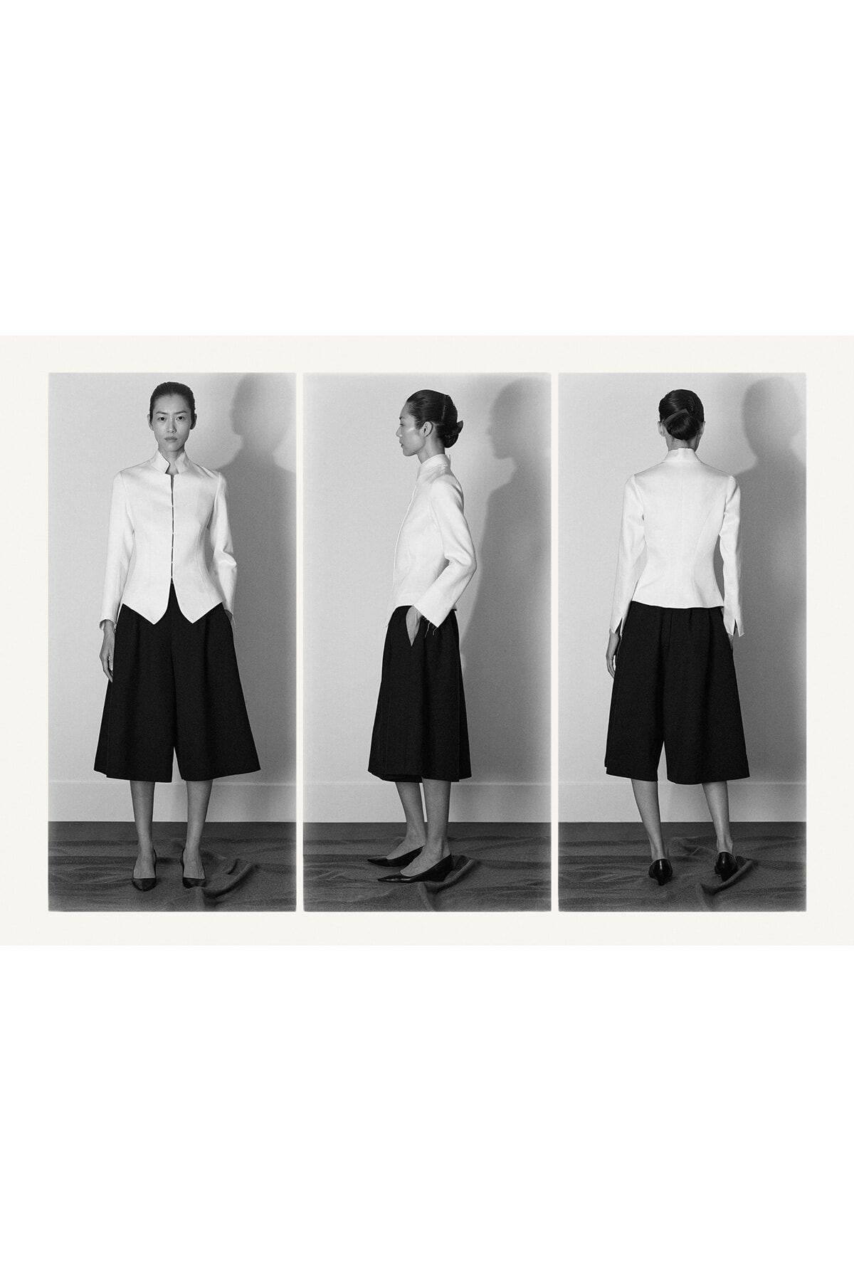 Three-panel grayscale photo of a woman in a white tailored blazer and black culottes, shown in front, side, and back views.