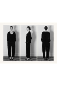 Triptych of a woman in a black velvet outfit: front, side, and back views against a light wall, wearing wide-leg pants and heeled shoes.