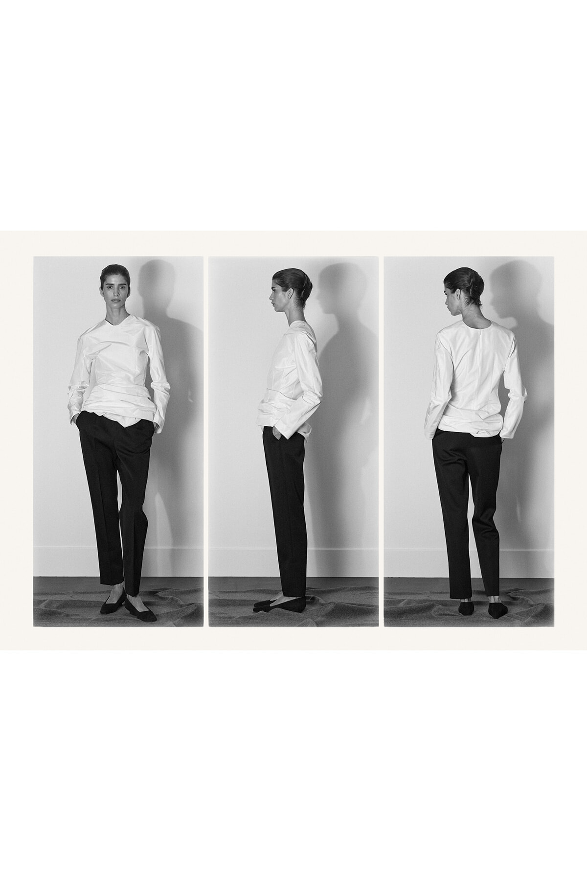 Triptych of a model in a white shirt and black trousers, shown from front, side, and back in a studio setting.