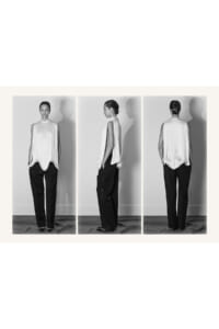 Triptych of a model in a sleeveless pleated white top and black wide-leg pants, shown front, side, and back.