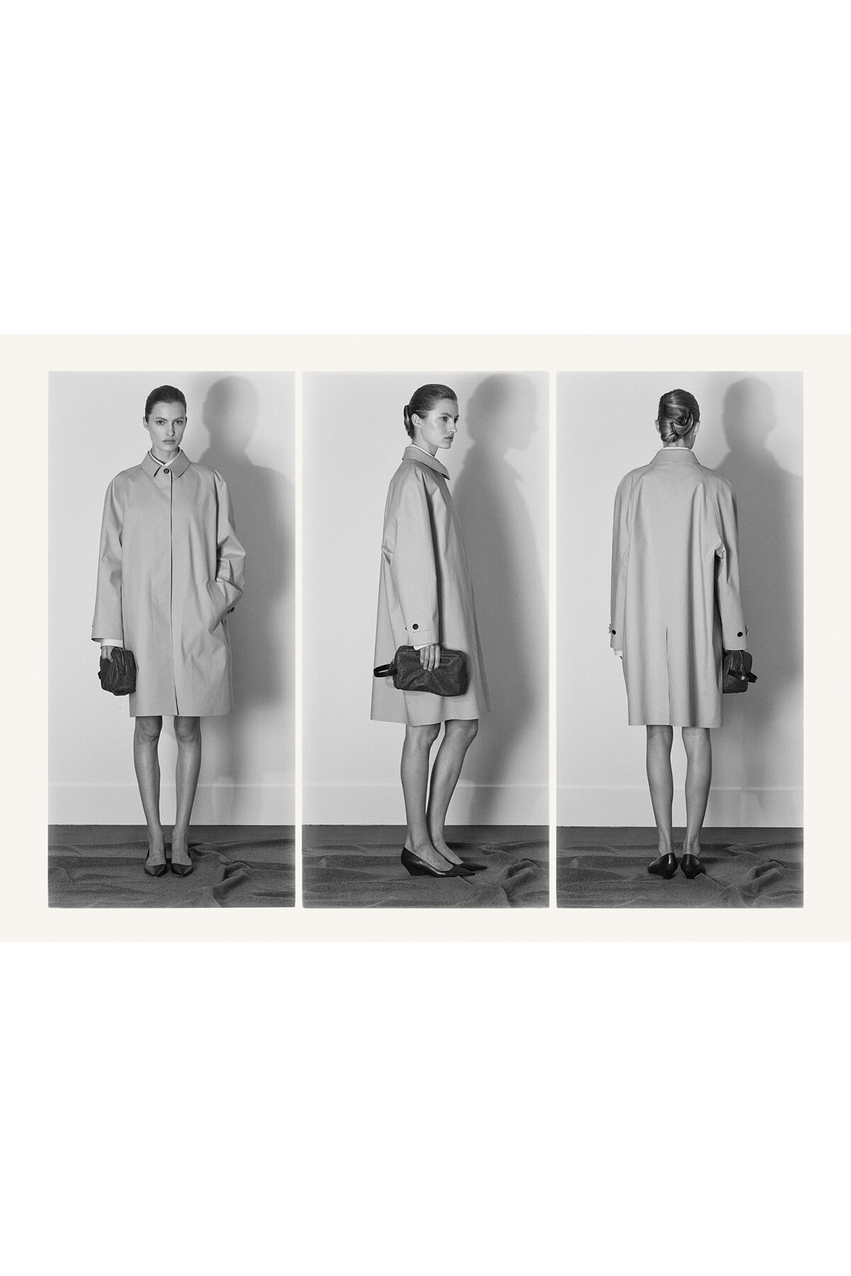 Black-and-white triptych of a woman in a knee-length trench coat shown from front, side, and back, holding a small clutch and wearing flats.