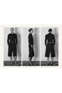 Triptych of a woman in a black cropped jacket and knee-length shorts, shown from front, side, and back in a studio (b&w).