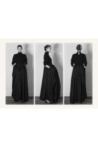 Black-and-white triptych of a woman in a black turtleneck and full-length skirt, shown front, side, and back.