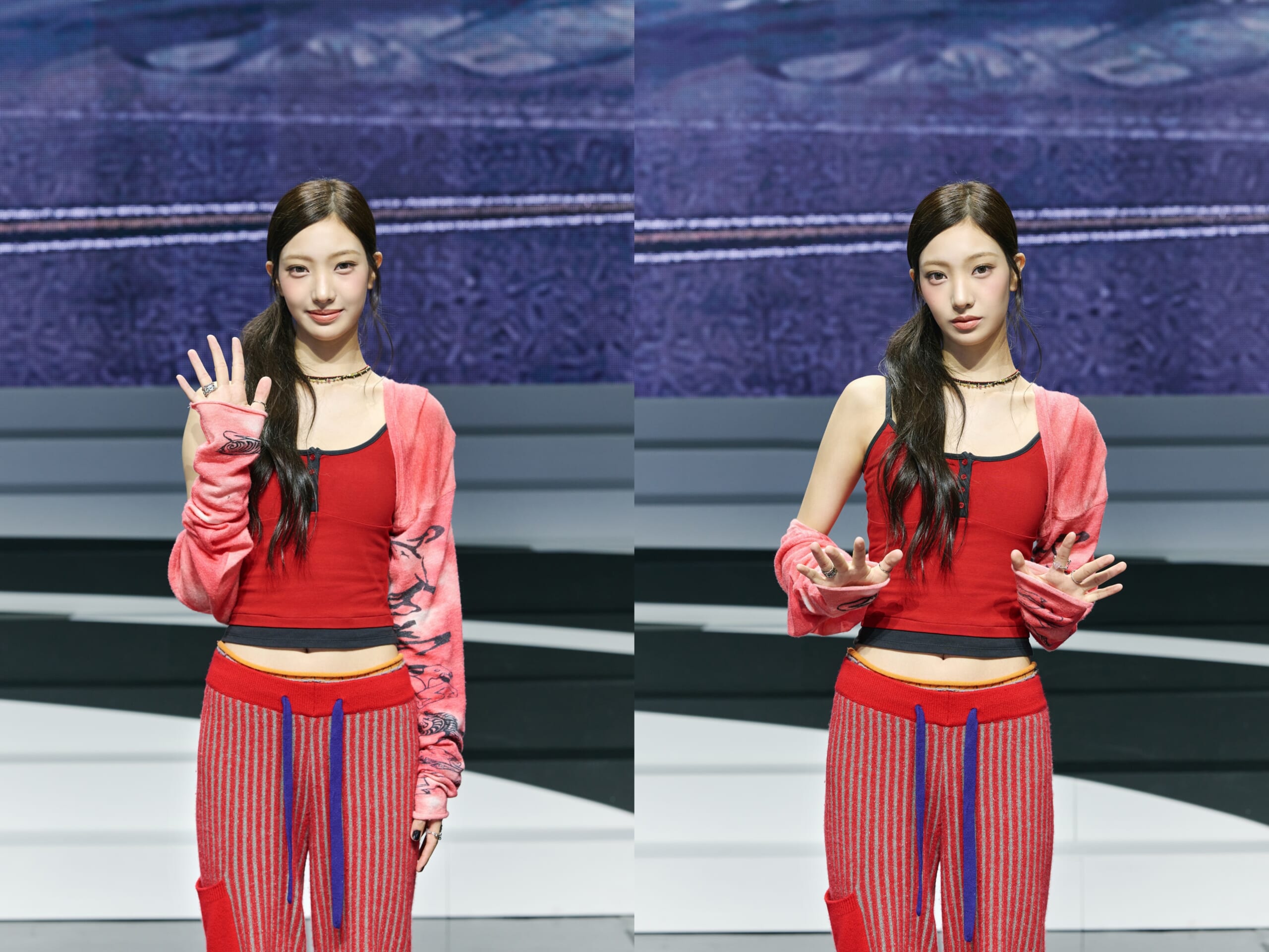 Two mirrored images of a young woman on a stage, wearing a red outfit with a pink cardigan, raising her hands in a gesture of greeting.